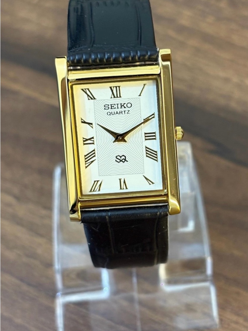 Vintage Seiko Gold Tone Rectangular Dress Watch with Black Strap